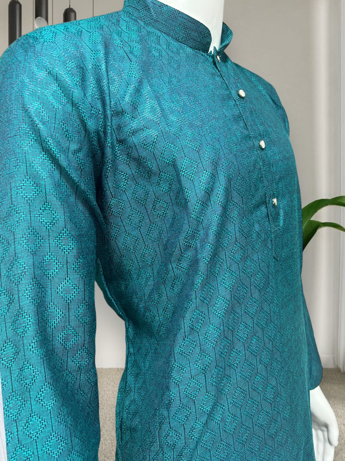 Self Weave Teal Kurta.